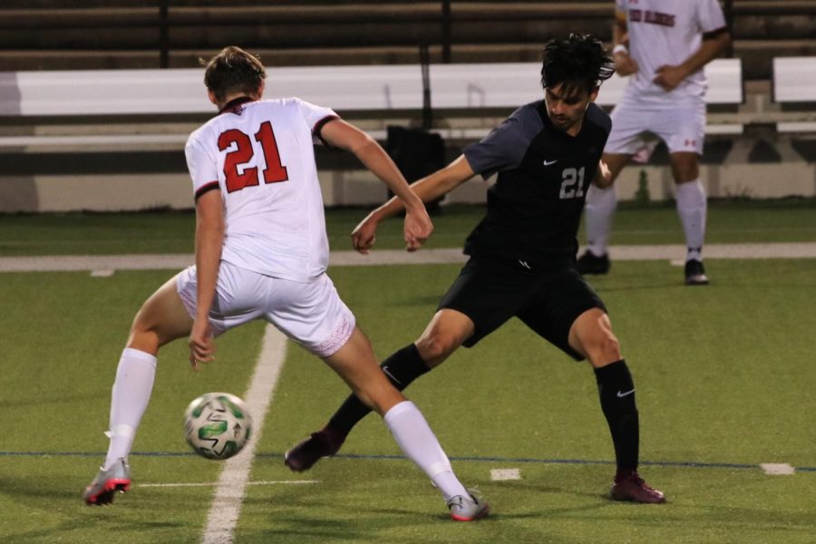 Double Up: 21 versus 21, senior Miguel Soto faces off against sophomore Axel Ruben in the center. In an attempt to steal, Soto begins to think back. "I was relieved because this is my last year," Soto said. "I thought we weren’t gonna make it.”